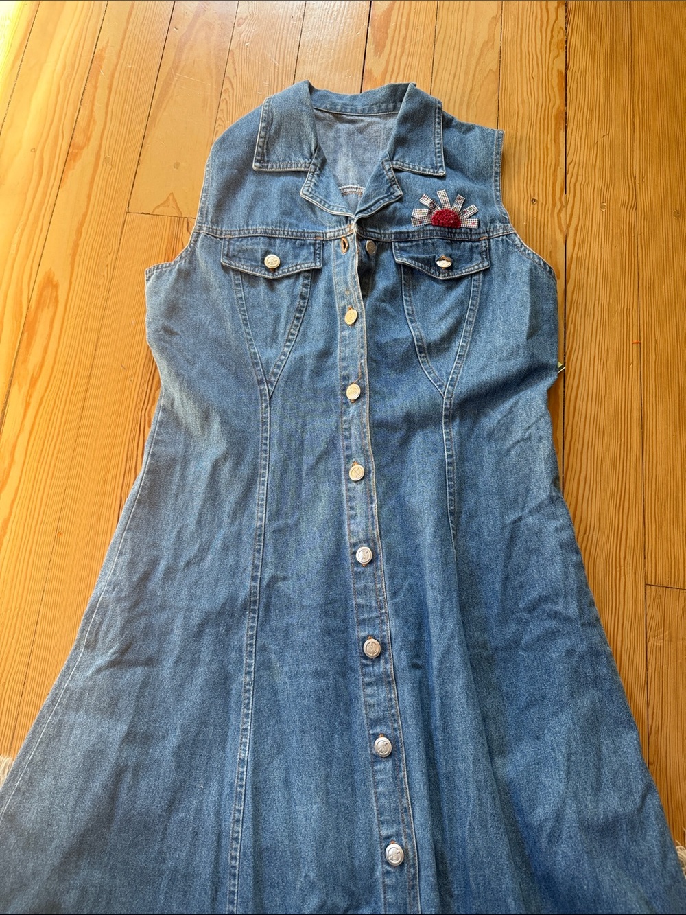 Sleeveless Button-Up Denim Dress with Embroidered Sunburst
